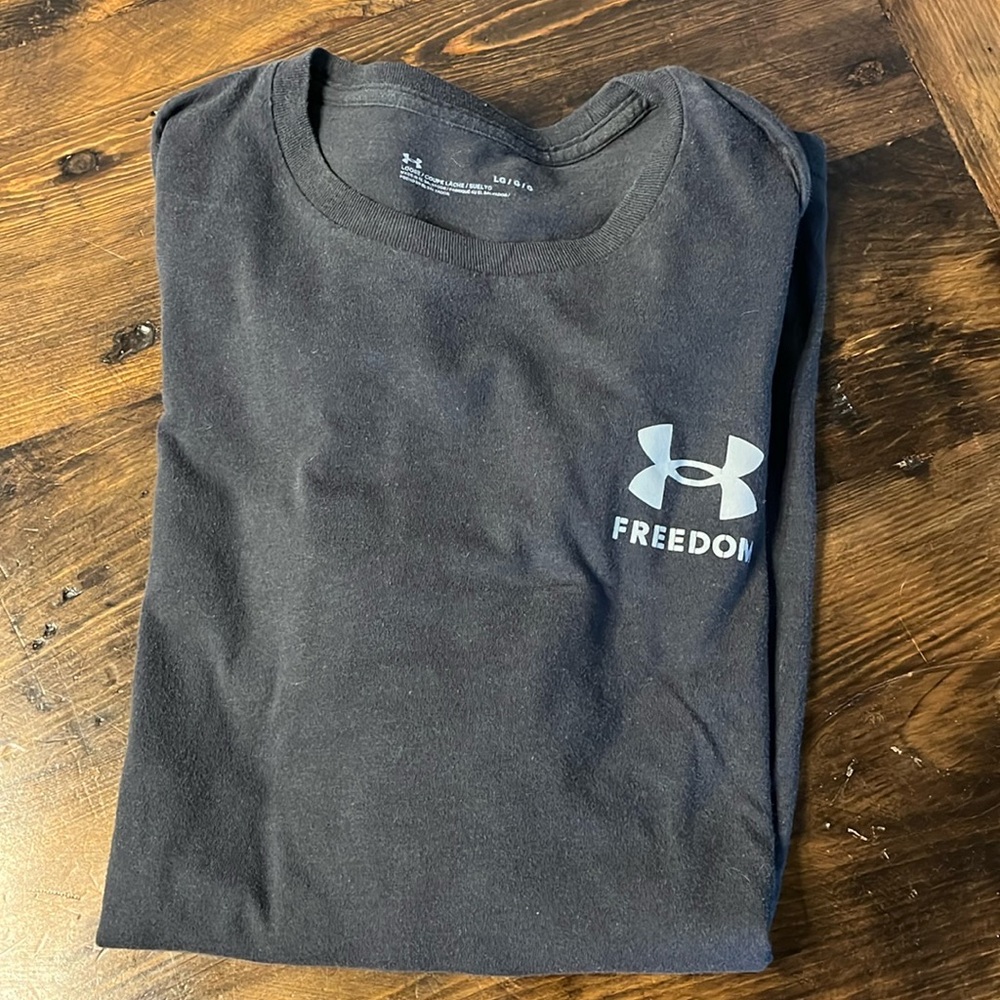 TWO under armor operation freedom shirts. Both shown in photos.
